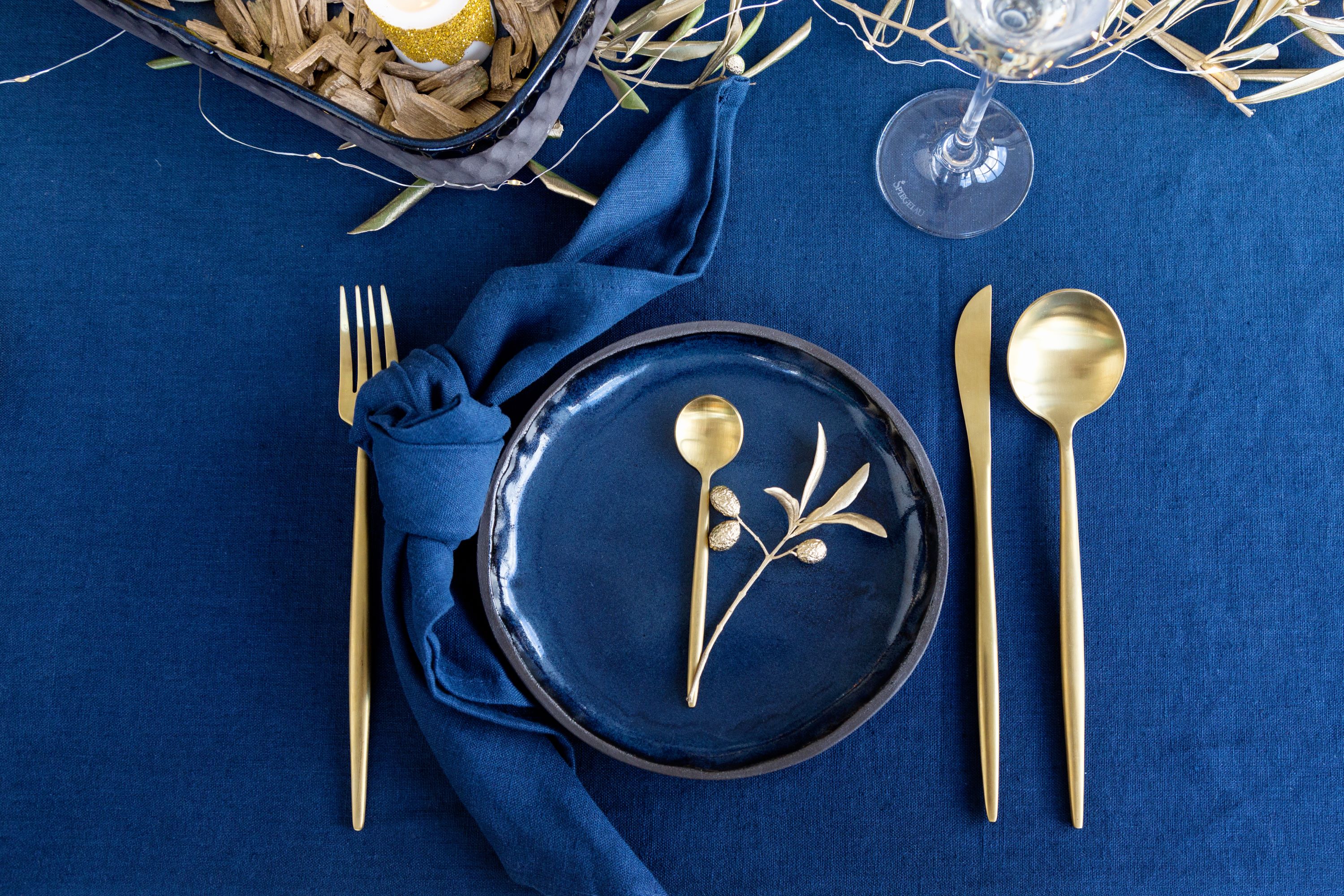 Table Setting Blue Shutterstock 1454346359
